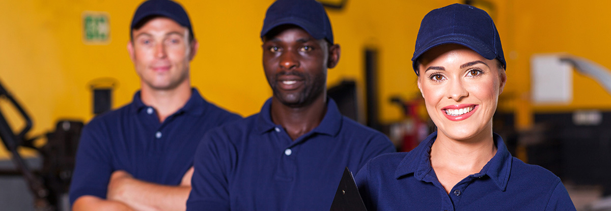 Three people smiling